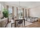 Charming dining room with chandelier, modern decor, and play area at 2501 Painted Buckeye Chase Se, Smyrna, GA 30080
