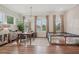 Elegant dining room with modern chandelier, large windows, and stylish decor at 2501 Painted Buckeye Chase Se, Smyrna, GA 30080