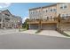 Street view of modern townhomes with garage parking, and private decks at 2501 Painted Buckeye Chase Se, Smyrna, GA 30080