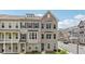 Attractive townhome with brick facade, black shutters and a well-manicured lawn in a desirable neighborhood at 2501 Painted Buckeye Chase Se, Smyrna, GA 30080
