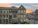 Charming townhome with brick facade, elegant shutters, and inviting front porch at 2501 Painted Buckeye Chase Se, Smyrna, GA 30080