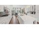 Open-concept kitchen with a spacious island, stainless steel appliances, and modern cabinetry at 2501 Painted Buckeye Chase Se, Smyrna, GA 30080