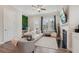 Cozy living room with comfortable seating, a fireplace, and serene decor at 2501 Painted Buckeye Chase Se, Smyrna, GA 30080