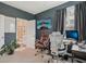Home office with two desks, flat screen TV and view to ensuite bathroom with tiled shower at 2501 Painted Buckeye Chase Se, Smyrna, GA 30080