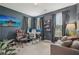 Comfortable home office with dark accent wall, stylish furnishings and large windows at 2501 Painted Buckeye Chase Se, Smyrna, GA 30080