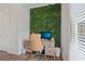 Stylish home office featuring a living green wall that brings a natural element to the workspace at 2501 Painted Buckeye Chase Se, Smyrna, GA 30080