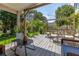 Beautiful deck and backyard featuring lush landscaping and outdoor seating at 1670 Burnt Oak Way, Dacula, GA 30019