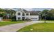 Beautiful two-story home with a well-manicured lawn, fresh exterior paint, and attached two car garage at 1670 Burnt Oak Way, Dacula, GA 30019