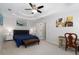 Bright main bedroom features a tray ceiling, carpet flooring, and an ensuite bath at 1670 Burnt Oak Way, Dacula, GA 30019