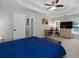 Spacious main bedroom features a tray ceiling, a TV, and lots of natural light at 1670 Burnt Oak Way, Dacula, GA 30019