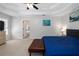 Spacious main bedroom with tray ceilings and an ensuite bath at 1670 Burnt Oak Way, Dacula, GA 30019