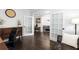 Elegant office featuring hardwood floors, french doors and neutral paint at 1670 Burnt Oak Way, Dacula, GA 30019