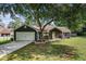 Charming single-Gathering home with a well-manicured lawn and a two-car garage at 50 Blackberry Lane, Covington, GA 30016