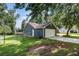 View of home featuring a two-car garage, an enclosed backyard, and a wooden deck at 50 Blackberry Lane, Covington, GA 30016