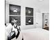 Cozy bedroom featuring a bed with decorative pillows and modern wall art at 510 Oak Dr, Hapeville, GA 30354