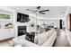 Spacious living room featuring a fireplace and open layout to kitchen at 510 Oak Dr, Hapeville, GA 30354