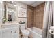 Cozy bathroom with tile accents and a tub and shower combination at 620 Peachtree Ne St # 911, Atlanta, GA 30308