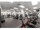 Well-equipped gym with cardio machines, weights, and mirrored walls at 620 Peachtree Ne St # 911, Atlanta, GA 30308