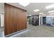 Hallway with vending machines, wood accents, and tile flooring at 620 Peachtree Ne St # 911, Atlanta, GA 30308