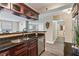 Kitchen featuring granite countertops, stainless steel appliances, and hardwood style floors at 620 Peachtree Ne St # 911, Atlanta, GA 30308