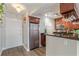 Kitchen with granite countertops, stainless steel appliances, and wooden cabinets at 620 Peachtree Ne St # 911, Atlanta, GA 30308