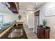 Kitchen featuring granite countertops, stainless steel appliances, and wine glass rack at 620 Peachtree Ne St # 911, Atlanta, GA 30308