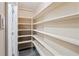Walk-in pantry with plenty of shelving for storage at 620 Peachtree Ne St # 911, Atlanta, GA 30308