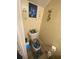 Charming bathroom featuring butterfly decor and neutral fixtures at 8959 Stonebridge Blvd, Douglasville, GA 30134