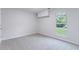 This bedroom has neutral carpet, a window for natural light, and a closet at 1333 Trailwater Chase Nw, Acworth, GA 30102