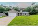 Charming single-story home with a well-maintained lawn and attached garage, perfect for suburban living at 1333 Trailwater Chase Nw, Acworth, GA 30102