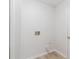 The laundry room has the connections for the washer and dryer at 1333 Trailwater Chase Nw, Acworth, GA 30102