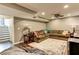 Basement featuring a comfortable seating area with a large sectional couch and a wine cooler at 1361 Chatley Way, Woodstock, GA 30188