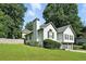 Well-maintained home on a lush lawn, with a fenced yard and lovely landscaping at 1361 Chatley Way, Woodstock, GA 30188