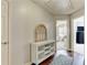 Hallway with wood floors and views into a bedroom and an office at 1361 Chatley Way, Woodstock, GA 30188