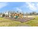 Neighborhood playground with play structures, swings, and a sandbox area at 1361 Chatley Way, Woodstock, GA 30188