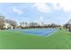 Community tennis courts with green and blue surfaces at 1361 Chatley Way, Woodstock, GA 30188