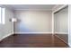 Bedroom featuring hardwood floors, an entry window, and a closet at 215 Piedmont Ne Ave # 502, Atlanta, GA 30308