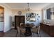 Elegant dining room with a round table, stylish chandelier, and curated artwork for sophisticated meals at 215 Piedmont Ne Ave # 502, Atlanta, GA 30308