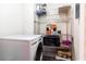 Convenient laundry room with shelving and modern washer/dryer at 215 Piedmont Ne Ave # 502, Atlanta, GA 30308