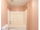 Bathroom featuring a shower-tub combo with tile walls and shower head at 3217 Aberrone Pl, Buford, GA 30519