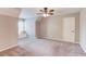 Large bedroom with carpet flooring, window seat and neutral color paint at 3217 Aberrone Pl, Buford, GA 30519