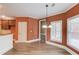 Breakfast nook features hardwood floors, natural light, and access to the kitchen at 3217 Aberrone Pl, Buford, GA 30519