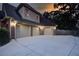 This three-car garage provides ample space for parking and storage in a brick home with neutral trim at 3217 Aberrone Pl, Buford, GA 30519