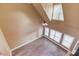 Spacious living room with tall ceilings, large windows, and hardwood floors at 3217 Aberrone Pl, Buford, GA 30519