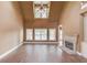 Inviting living room featuring tall ceilings, a fireplace and lots of natural light at 3217 Aberrone Pl, Buford, GA 30519