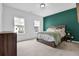 Inviting bedroom features a queen bed, area rug, dresser, and two windows for natural light at 3508 Mount Blue Ave, Tucker, GA 30084