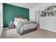 Inviting bedroom features a queen bed, area rug, and two windows for natural light at 3508 Mount Blue Ave, Tucker, GA 30084