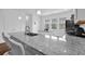 Spacious kitchen with granite countertops, stainless appliances, kitchen island, and white cabinetry at 3508 Mount Blue Ave, Tucker, GA 30084