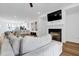 Comfortable living space with fireplace and view into the open-concept kitchen at 3508 Mount Blue Ave, Tucker, GA 30084