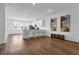 Stylish living area with hardwood floors flowing into an open kitchen with bar seating at 3508 Mount Blue Ave, Tucker, GA 30084